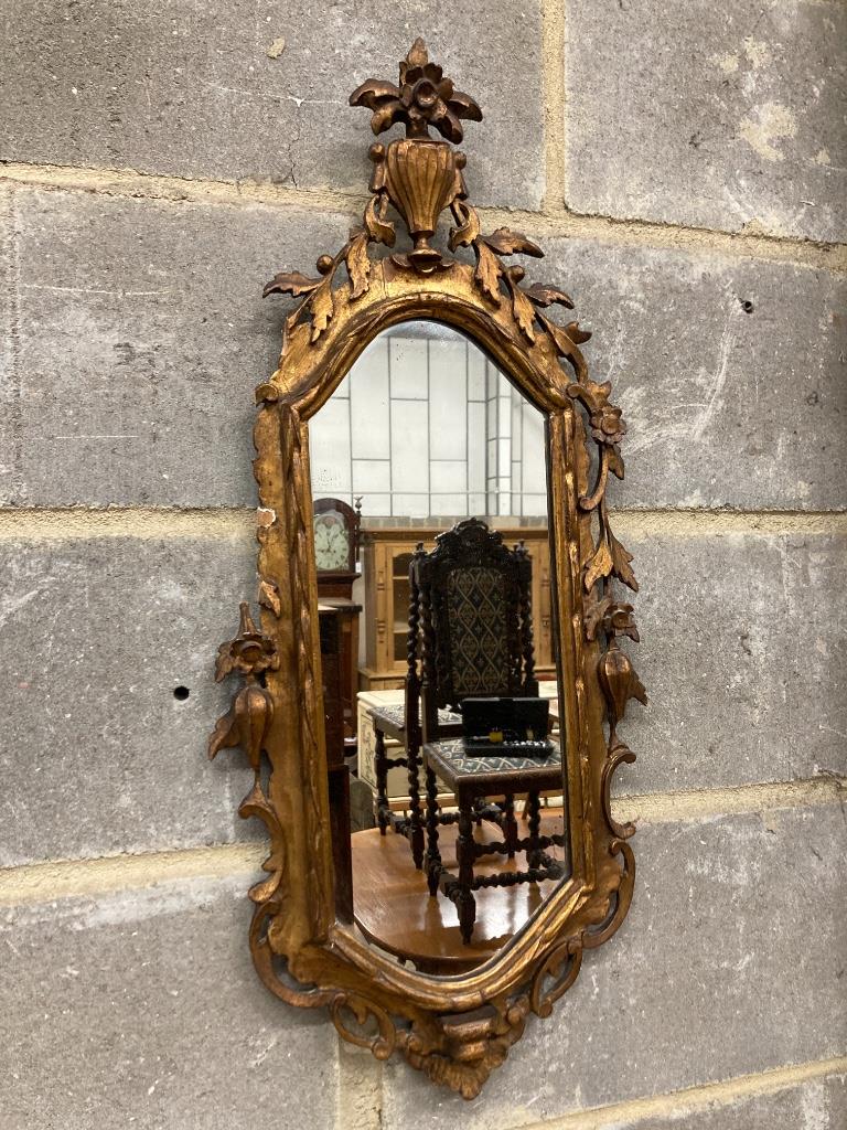 A pair of carved giltwood wall mirrors, width 30cm, height 74cm